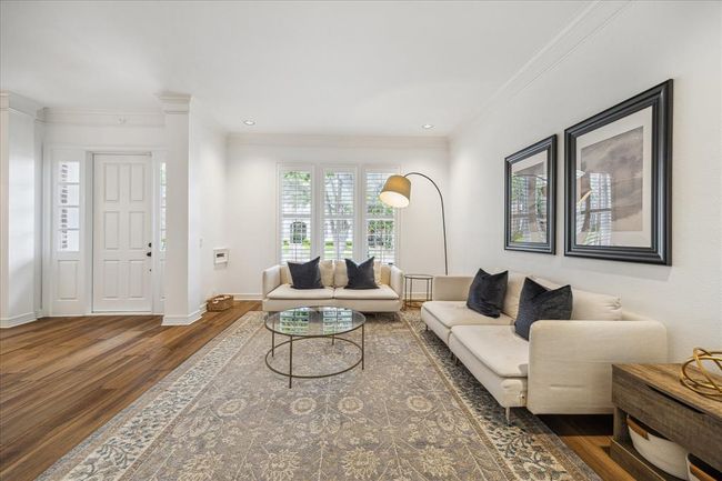 Oversized family room overlooks the front yard and is adjacent to the home office/study. | Image 4