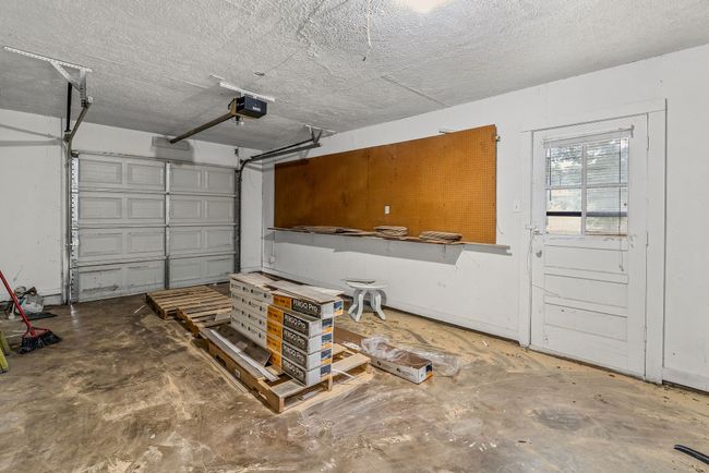 Garage featuring a garage door opener | Image 22