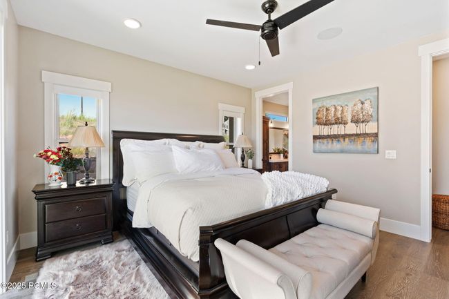 Master bedroom main level in suite master bathroom and walk in closet | Image 12