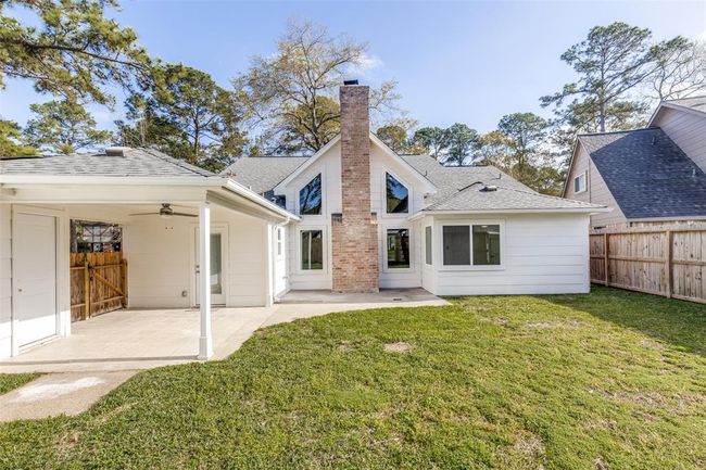 Back yard with covered patio | Image 31