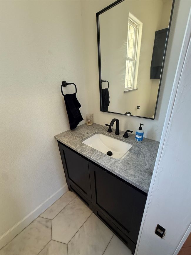 Bathroom with vanity and baseboards | Image 25