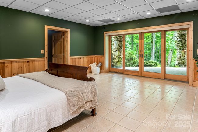 2nd bedroom with terrace level exterior access (lower level driveway allows easy (no steps) access to basement level | Image 31