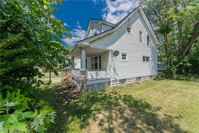 View of property exterior featuring a yard | Image 3