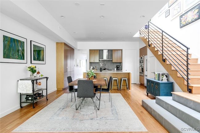 The open dining and bar area link the living and kitchen seamlessly. | Image 13