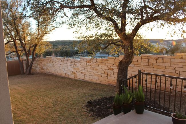 View of yard with a fenced backyard | Image 38