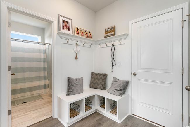 Mudroom featuring wood finished floors | Image 12