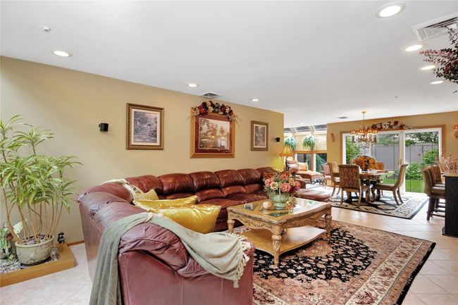 Living room featuring a skylight | Image 5