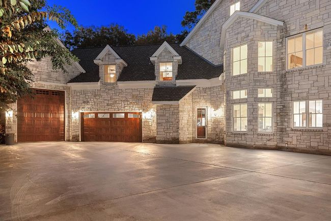 Parking will never be a problem here, with a five car garage - one can house a full size RV, and porte-cochere | Image 47