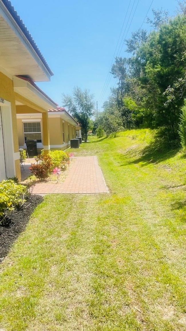 1589 Cumin Dr, Home with 2 bedrooms, 2 bathrooms and null parking in POINCIANA FL | Image 5