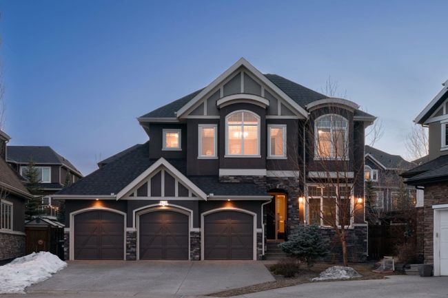 26 Aspen Dale Court Sw, Home with 4 bedrooms, 3 bathrooms and 6 parking in Calgary AB | Image 1