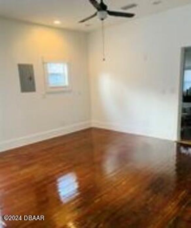FRONT CONFERENCE AREA TO KITCHEN | Image 8