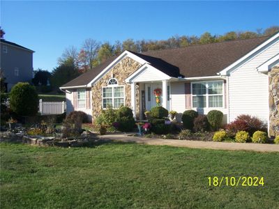 2024 Lexington Dr, House other with 4 bedrooms, 2 bathrooms and 2 parking in Dunbar Twp PA | Image 2