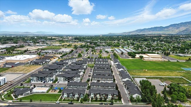 Aerial view of residential area featuring a mountainous background | Image 32