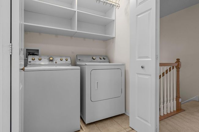 For your convenience, the laundry is located upstairs and has storage cubbies. | Image 33