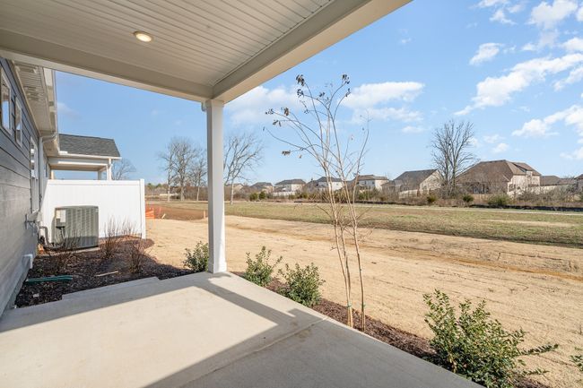 Great backyard backing to green space and tree line! | Image 25