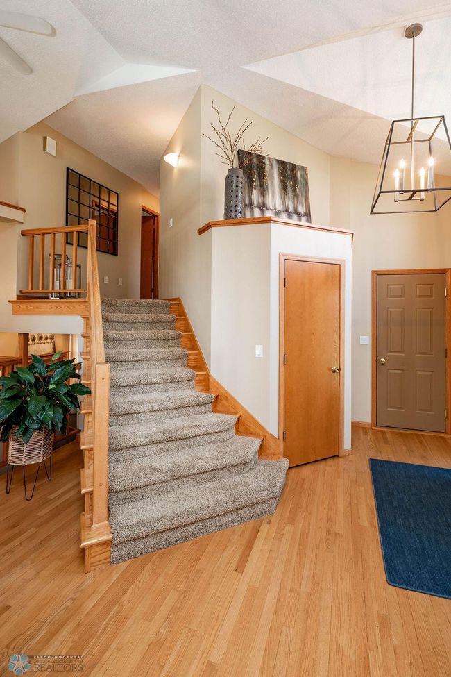 Wide staircase w/craftsman woodwork | Image 30