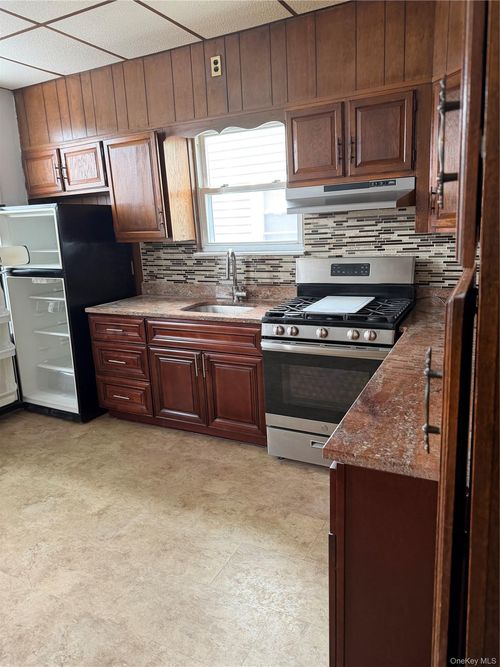 9731 92nd Street, New York, NY, 11416 | Card Image