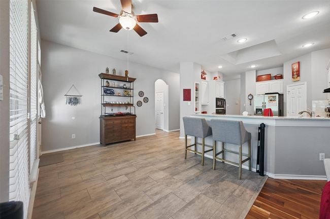 Breakfast nook with additional seating at the breakfast bar | Image 9