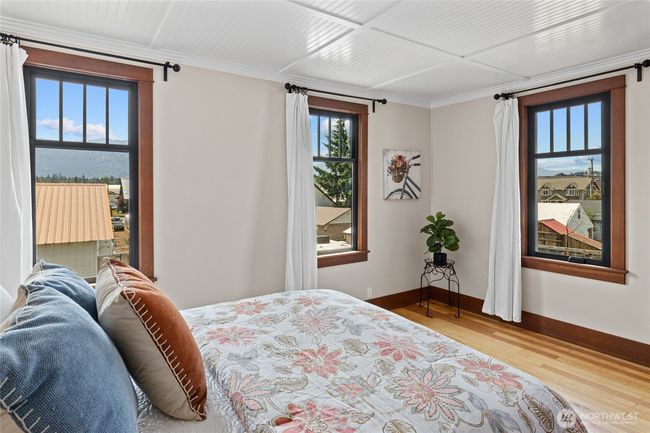 Views of Peoh Point can be enjoyed from the primary bedroom. | Image 23