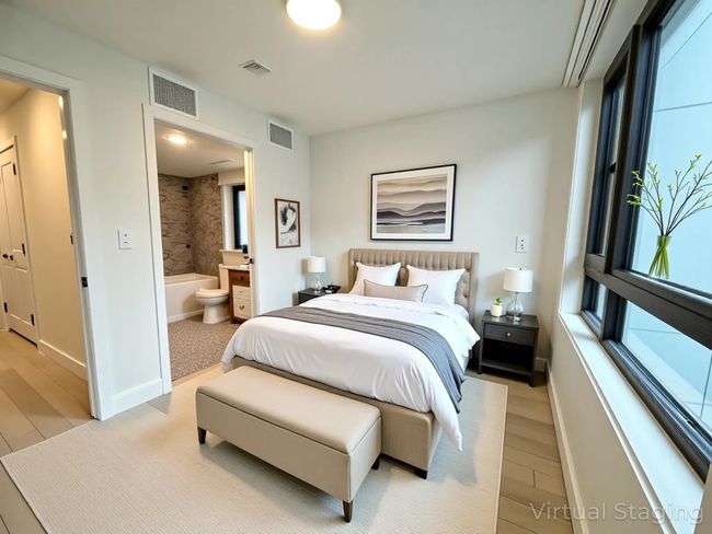 Bedroom with baseboards, light wood-style flooring, and visible vents | Image 4