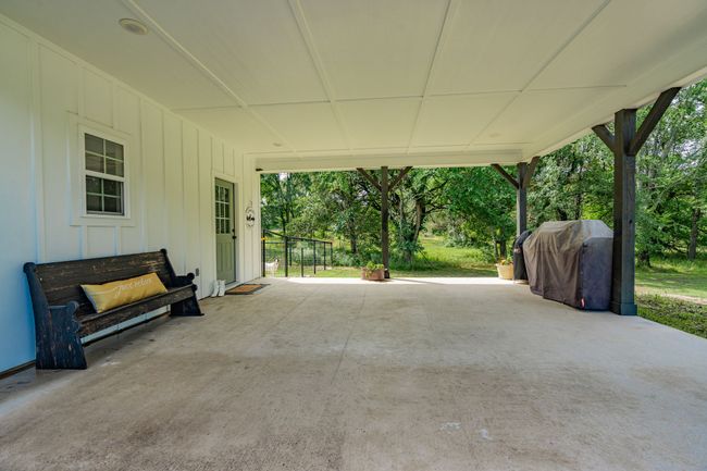 parking area or patio | Image 31