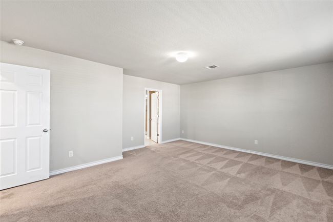 Upstairs carpeted primary bedroom | Image 20