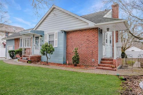 241 Woodbury Rd, Hicksville, NY, 11801-3027 | Card Image