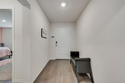 Doorway to outside with light hardwood / wood-style flooring | Image 3