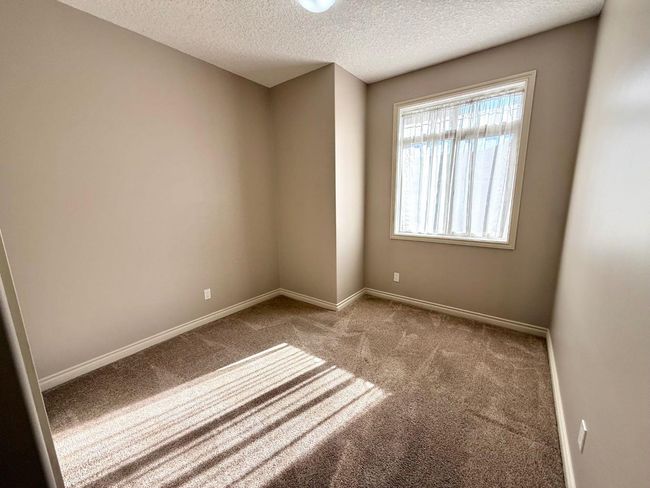 304 Sunvale Cres Ne, Townhouse with 2 bedrooms, 1 bathrooms and 2 parking in High River AB | Image 32