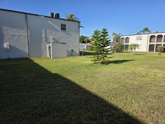 Greenspace and a quick walk to the pool and clubhouse. | Image 15