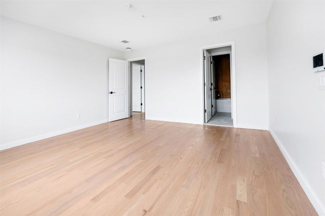 Unfurnished room with light hardwood / wood-style flooring | Image 45