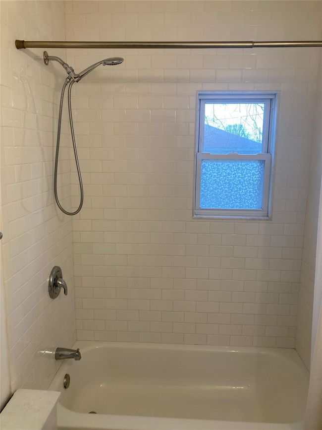 Full bathroom featuring shower combination | Image 6