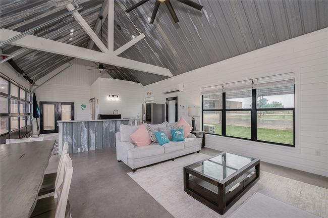 Pool House living space view | Image 26