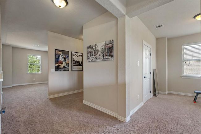 A few of the open concept between the flex space, media room, and game room. | Image 33