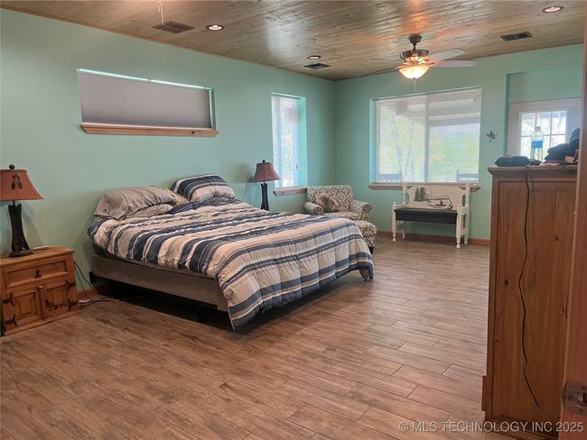 Master bedroom with access out to back patio | Image 13