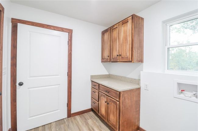 Kitchen featuring light hardwood / wood-style flooring | Image 20