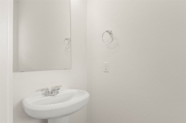 Bathroom featuring a sink | Image 23