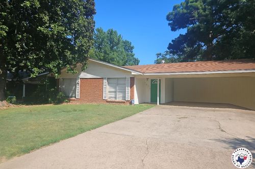 702 Hawkins Ave, Wake Village, TX, 75501-6025 | Card Image