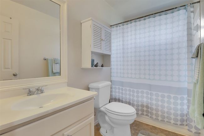 Full bath with vanity and a shower with shower curtain | Image 26