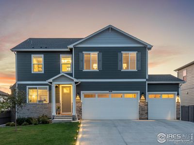 Enjoy beautiful Berthoud sunrises and sunsets with this East/West facing home! | Image 1