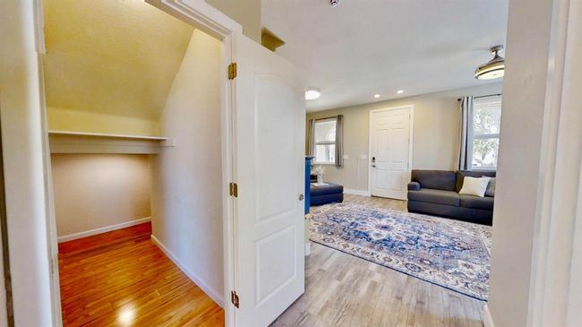 Storage area under the stairs | Image 29