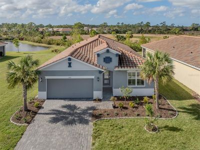 225 Daylily Boulevard, House other with 4 bedrooms, 3 bathrooms and null parking in Nokomis FL | Image 1