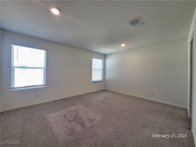 Unfurnished room with carpet, visible vents, baseboards, and recessed lighting | Image 14