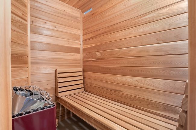 Sauna / steam room featuring wooden walls | Image 46