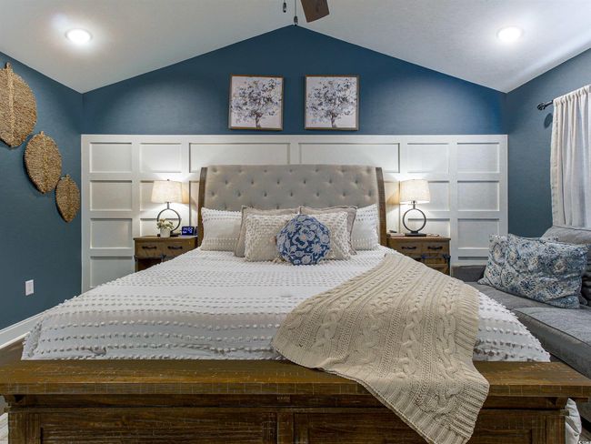 Bedroom with ceiling fan, wood-type flooring, and lofted ceiling | Image 18