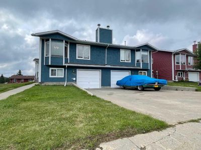 107 Assiniboine Dr, House other with 4 bedrooms, 2 bathrooms and 6 parking in Swan Hills AB | Image 1