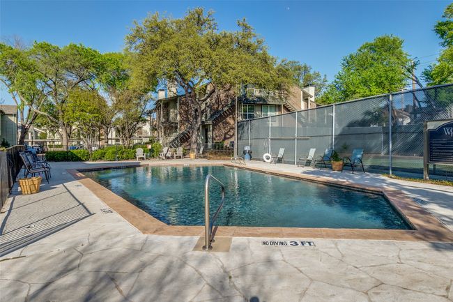 Pool with a patio and fence | Image 24