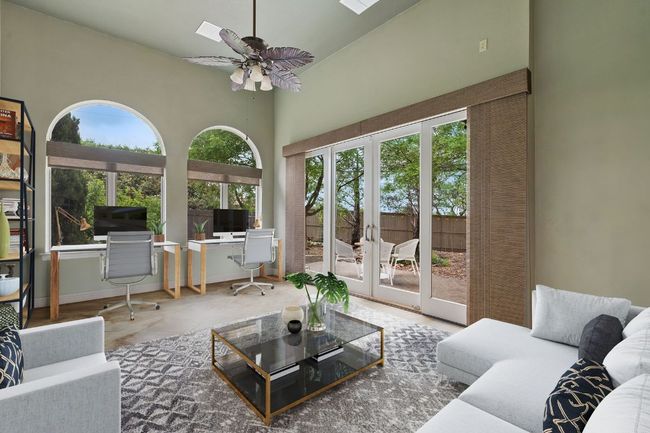 Living area featuring a healthy amount of sunlight, ceiling fan, and french doors | Image 20