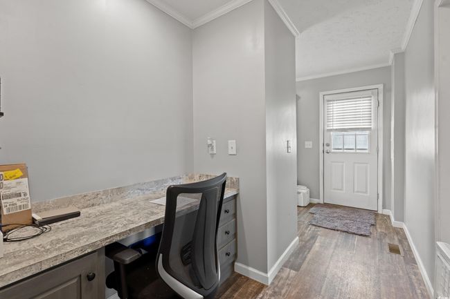 Bathroom featuring wood finished floors and ornamental molding | Image 20