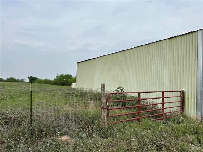 View of pole building featuring fence | Image 4